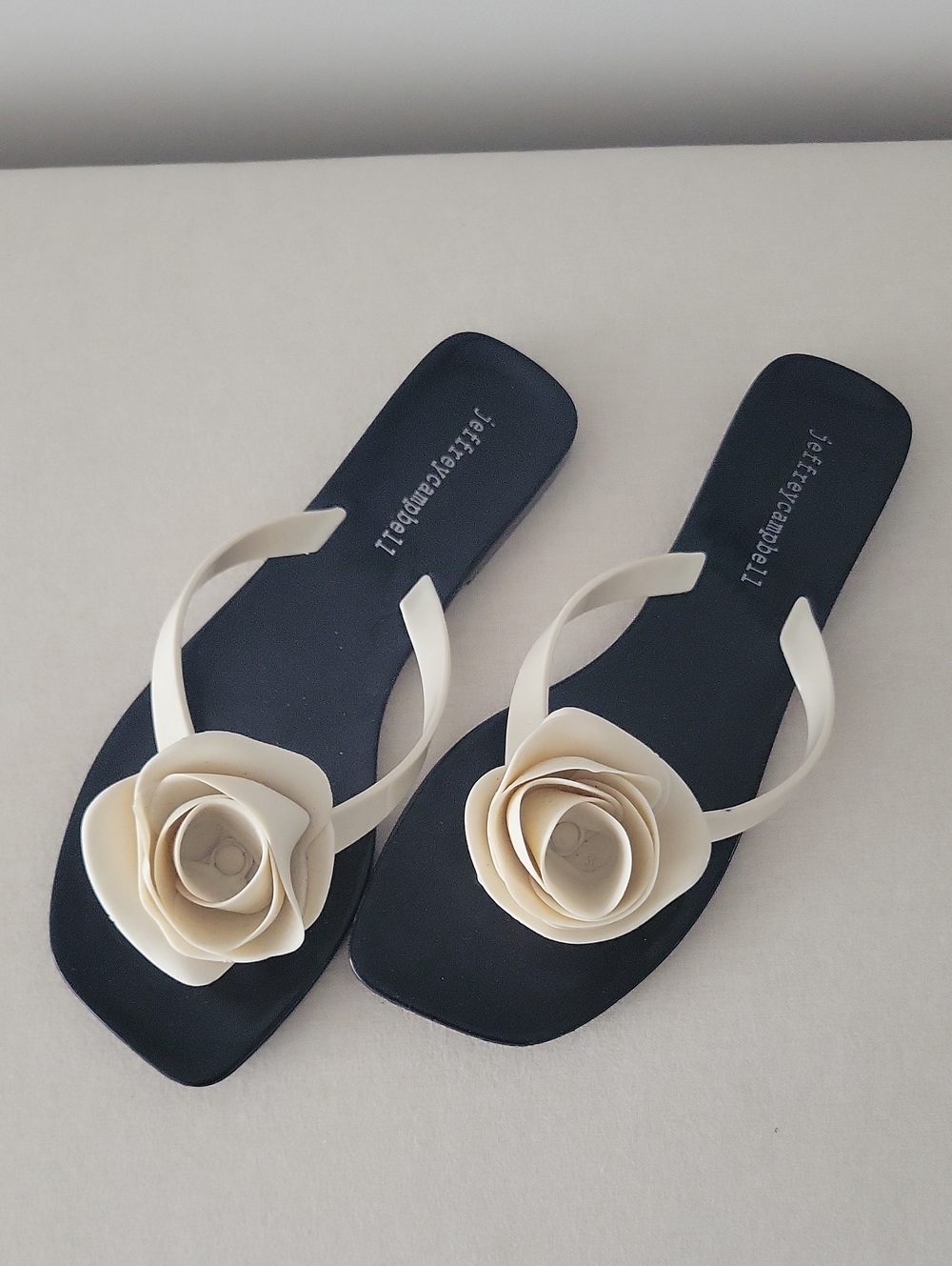 Jeffrey Campbell Black Flip Sandals with Cream Flower